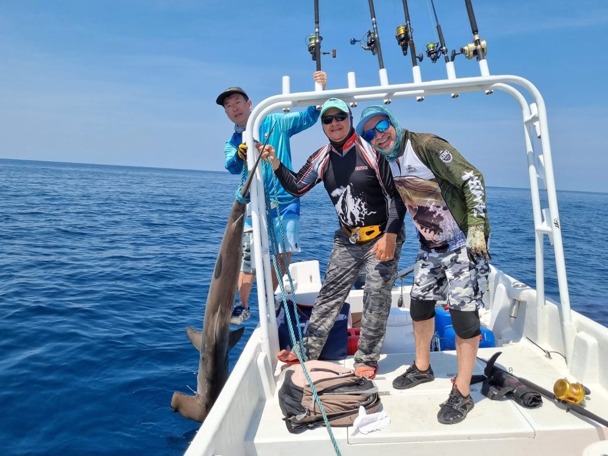 The crew aboard the panga